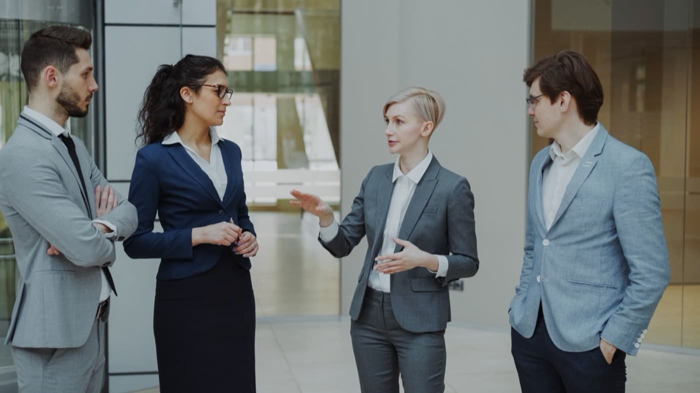 Balance scale weighing the cost and time of the Salesforce Administrator certification against a job offer
