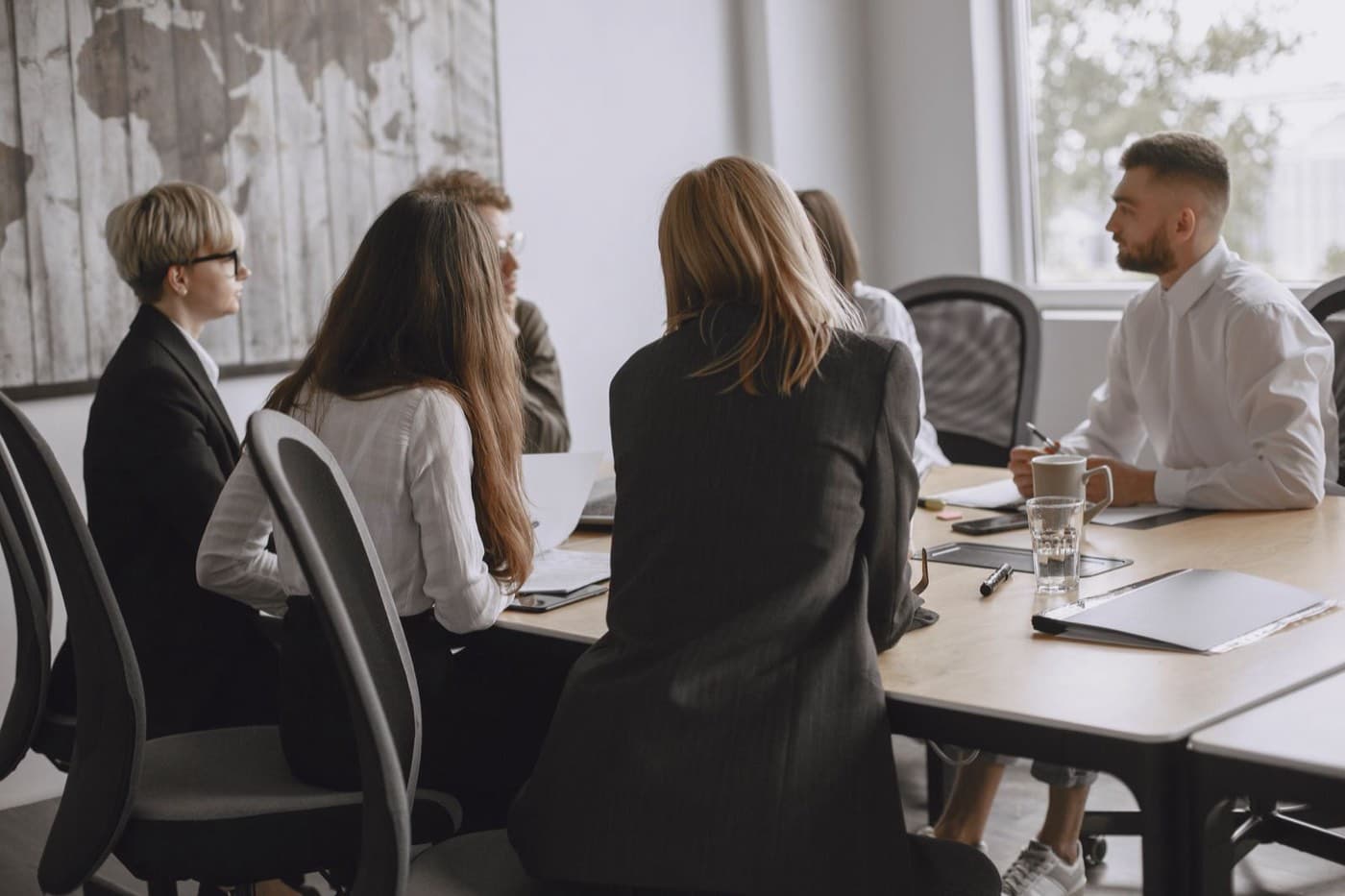 Fragmented customer data records merging into one unified profile, representing the Salesforce Data Cloud Consultant certification